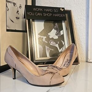 Salvatore Ferragamo suede pump with lace up accent
